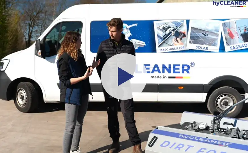 Two hyCleaners talking in front of a hyCleaner van